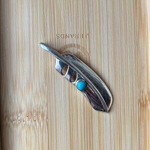 Sterling Silver Feather Pendant with Turquoise Stone